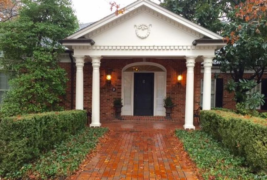 Charming classic Georgian with 3 generous bedrooms, 5 (3/2) baths set quietly upon 1.8 acres in premier Ladue neighborhood. The gracious Entry Hall opens to Living Room with ornate cabinetry framing gas fireplace. Full wall of bookcases with wet bar anchors cozy Den. Across the parqueted hall, a Formal Dining Room displays tall bay windows. A possible third bedroom, the Family Room, has a boxed beam ceiling and steps into adjoining Screened Porch to overlook the level yard. The brick courtyard Terrace is accessible from multiple areas. Enjoy large Kitchen with high end appliances and abundant storage, Breakfast Room with useful Butler's Serving Pantry and Laundry Room with half bath. See the two additional large, en suite Bedrooms, an Office, Guest Powder Room, and the over-sized three car garage. Most amazing is the enormous unfinished Lower Level spanning the full footprint of the home. Possibilities are endless. Enjoy your privacy on the elegance of this low maintenance property.