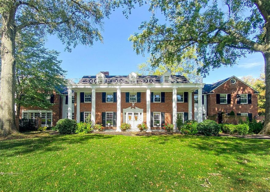 Imposing, historical home perfectly poised on nearly 2 acres in the heart of Ladue, footsteps from MICDS. Built-in 1936 & thoughtfully expanded in the last decade, this classic center hall features period appropriate, custom millwork & one of a kind, milled doors. Stunning floating, curved staircase gracefully ascends/descends all three floors. Classic blk. & white marble foyer, paneled library w/ frplc. & built-ins, gracious formal LR & DR, elegant powder room w/ dressing table, palatial, updated kitchen w/ 2 islands, triple waterfall granite, built-in Miele espresso machine, Wolf range, 48" Subzero fridge, ice maker, + an induction cooktop, hearth room, 2 pantries. master suite w/ adjoining sunroom, his & her baths, 2 walk-in closets, sitting room, add'l 3 bdrms, 3 baths, finished lower level w/ stunning home theatre recently updated, walk-in wine cellar, grand salt water pool & formal gardens, cozy courtyards w/ antique wrought iron gates, bluestone front porch, majestic columns. Additional Rooms: Wine Cellar