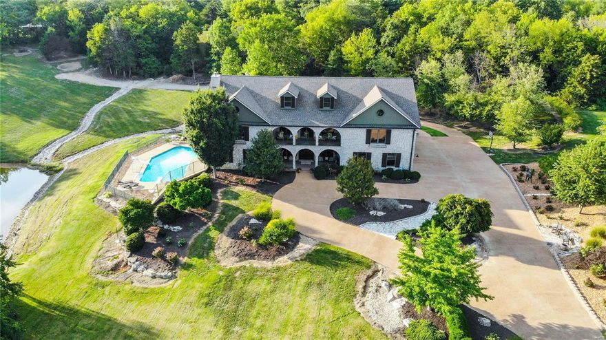 As seen on Fox's reality TV show, "American Dream Home", elegance and excellence are a few of the many adjectives that describe this one-of-a-kind property in Franklin County. This estate will bestow you with all the amenities your heart desires. From the stocked lake, to the in ground pool, down to the theatre and ample outdoor seating areas, you'll be sure to indulge in all of life's pleasures. Sitting on over 5+ acres, this unique oasis has over 9000+ square foot of living space with 5 bedrooms and 6.5 baths. Wake up in an unprecedented master suite with an oversized bathroom, including a sitting area, and multiple closets and toilets. Accessibility is key in this home with two separate laundry rooms on the main floor and upstairs, convenience of entry through the back patio, and a four car, oversized garage to fit all of your toys. Round out this beautiful paradise with multiple wet bars, three fireplaces and butler pantries for any entertainment occasion. Suitable for Bed/Brk Some Accessible Features Additional Rooms: Mud Room