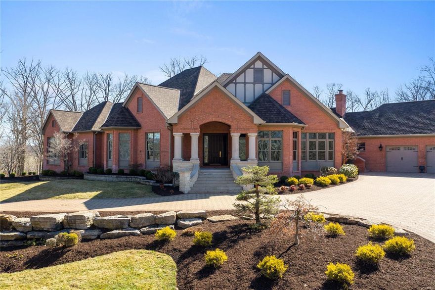 Handsome, fully-updated traditional, half-timbered house with limestone exterior detailing on an incredibly private 11+ acres with a stocked pond for fishing. Only a short drive to beautiful St. Albans. High-efficiency geothermal heating and cooling. Open floor plan ranch, ideal for entertaining with chefs kitchen, all Wolf & SubZero appliances, custom cabinetry, quartz countertops. Serving room adjacent to kitchen and dining room has custom island with ample space and built-in wine/beverage cooler. Hearth and breakfast space open to kitchen with floor-to-ceiling windows for terrific natural light. Media room with stadium seating and powered leather recliners. Custom-designed pool with cave, multiple waterfalls, beach entrance. All five bedrooms en-suite. Lower level billiard room with full bath, walk-out access to pool and expansive workout space. Sprawling paver drive with 6 car garage. Horse property not included with this sale, but owners would consider selling additional acreage.