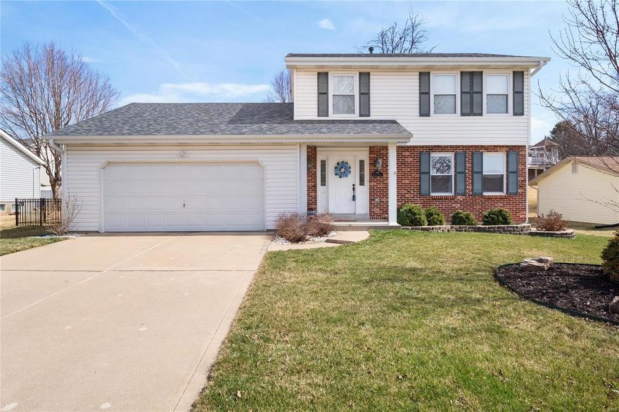 Upgraded Brick front Two Story in Hanover Manor.  Warm Wood floors greet you in entry way and run thru majority of first floor. Spacious Family Room with built in book shelves, gas fireplace with brick hearth and surround, and bay window.  Kitchen features 42” cabinets, granite tops, stainless steel appliances, and ceramic tile backsplash. Spacious Master Bedroom Suite upstairs w/ walk in closet.  Master bath with newer vanity and shower.  Two other beds for the family upstairs.  Updated 2nd bath as well. Rear yard with freshly stained deck and fully fenced yard.  New Roof 2021. Two car garage.  Awesome St. Charles West schools—Go Warriors!! Great value in convenient location.