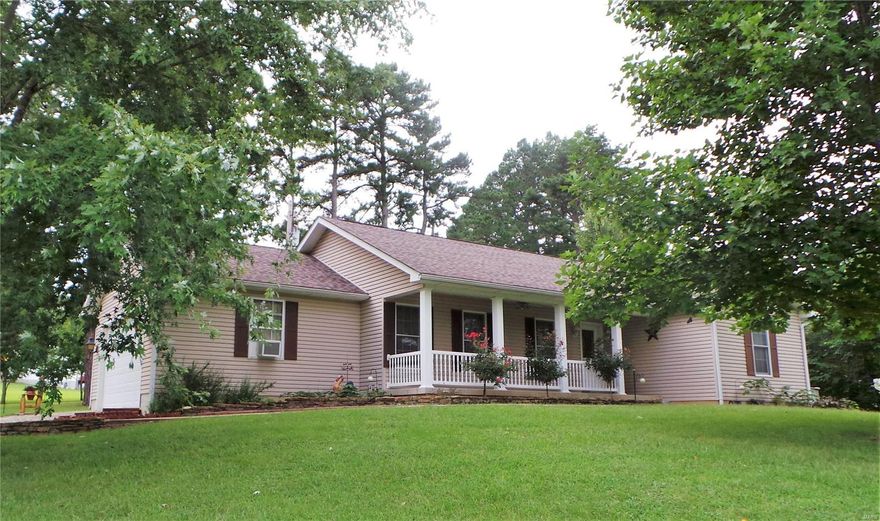 COUNTRY LIVING!  Step inside this well maintained, Ranch Style, 3 Bed/ 2 full bath home that sits on a beautiful 3.1+/- acres.  As you enter the front you'll notice the inviting covered porch.  Step into the foyer and instantly notice the vaulted living room. The Kitchen features plenty of custom cabinets, counter space, a Refrigerator and a gas range, that will stay with the house. The breakfast room has French doors that walk out to your cover patio. Circle around and you'll be in the laundry area where the washer/dryer will stay as well. The W/I pantry is a great bonus. On the other side of the house is the master suite with a W/I closet & a full bath. Down the hall is another full bath and 2 more bedrooms. Outside is great for entertaining. Enjoy the summer in the above ground pool and nice size deck.  Let's not forget the huge outbuilding that can be a workshop, man cave or a home for all your toys.  In addition, a shed, a pool house & so much more!  The only thing missing is YOU!