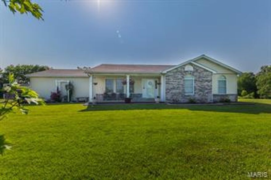 Back on Market NO FAULT of SELLERS! 3 acres & 1500sqft in desireable Emerald Green neighborhood. Beautiful brick veneer front accents the carefree vinyl siding. Enter into the vaulted great room w newer carpeting. Open concept design w full dining room open to kitchen.  Kitchen features breakfast bar, oak cabinets, pantry & lots of counter space.  Mud room w tons of storage & washer and dryer hookups if you prefer main floor laundry.  Split bedroom design makes for a private master bedroom w valuted ceiling, walk-in closet & en suite bath. Two other ample size bedrooms & another full bath finish off the main floor. Large covered deck off the dining room leads to great outdoor entertaining area & wonderfully maintained above ground pool. 2 car side entry garage. 3 acre lot gives plenty of room for toys, outbuilding, etc. Entirely new septic system ($16,000), newer architectural roof (7yrs) & newer HVAC system as well.  Only 12 mins to Wentzville or Troy amenities & Lincoln Co Taxes.