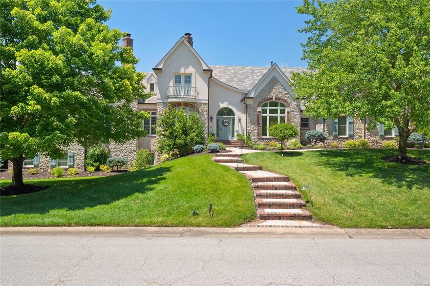 Stunning stone/brick custom ranch backing to the 17th fairway of St. Albans Lewis & Clark golf course. As you enter you'll find a private study with a spiral staircase up to a private library with built-in bookcases. A generously sized dining room is perfect for gatherings. The 2 story great room features a large fireplace and built-in bookcases. A custom wall of windows, with removable stained glass, allows for ample natural light and overlooks the golf course. Beautiful kitchen with granite countertops, center island, double ovens, gas range, and opens to the breakfast room and an adjoining sunroom with French doors to the patio. Spectacular vaulted master suite with a fireplace, double walk-in closets and a luxury bath with double vanity, walk-in steam shower, and a jetted tub. Finished walk-out lower level with a rec room, walk-behind wet bar, game room, and 3 bedrooms each with a private full bath. 4 car garage, patio with fireplace, and so much more! Additional Rooms: Mud Room, Sun Room