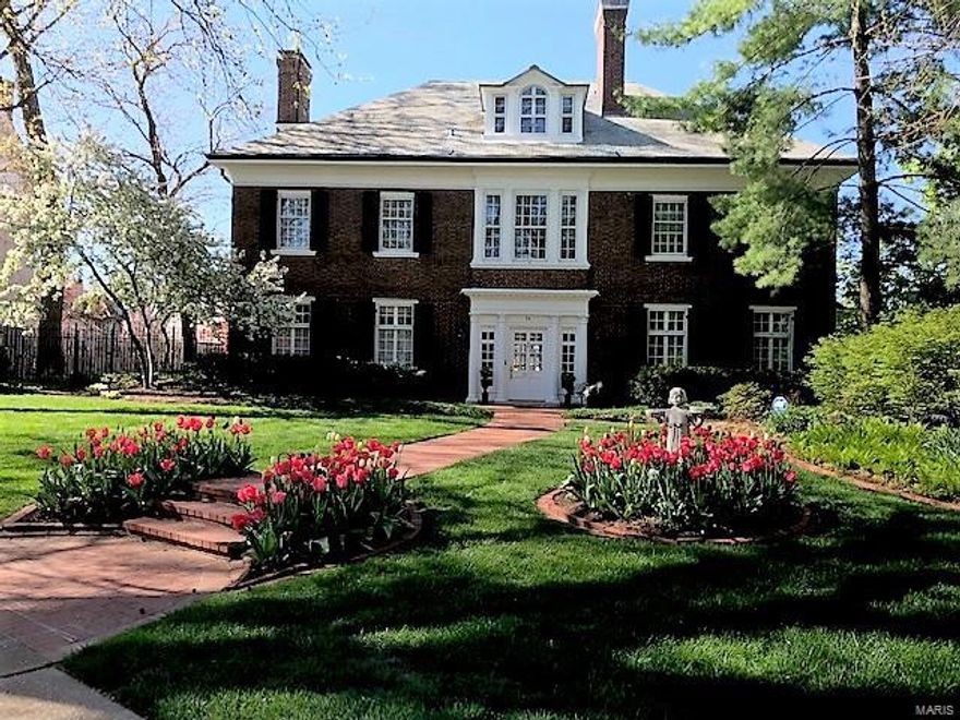 Don't miss this opportunity to be a part of St. Louis history!  Beautifully updated and meticulously maintained Georgian revival home on one of St. Louis' most prestigious streets. Regal foyer with grand staircase, recently refinished original wood floors, crown molding and one of kind mill work throughout. The living room showcases a stunning fireplace, custom shelving and french doors leading to the resurfaced pool and pool patio that is surrounded by mature gardens.  A true urban oasis.  The impressive dining room has a gas fireplace and beautiful turn of the century details.  The recently updated kitchen includes granite counters, marble backsplash, stainless appliances, and adjacent butlers pantry with wet bar and wine cooler.  First floor laundry.  Spacious master suite includes impressive walk in closet and en suite bath.  4 additional beds, all with wonderful closet space, and 2 full baths. The 2nd floor family room is a wonderful retreat.  Attached 2 car garage. Additional Rooms: Sun Room