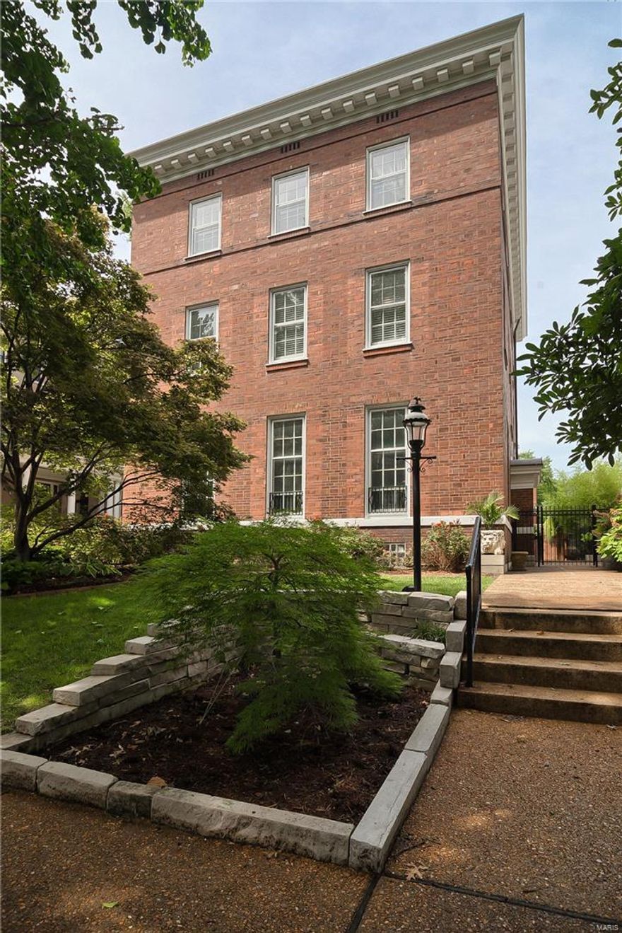 Historically refined & extensively updated, this Federal-Style prominently resides on one of the most desirable gated streets of the Central West End. A true chef's kitchen features hand-crafted Amish cabinetry, heated floors & granite. Wolf six burner stove with dual ovens, Viking refrigerator, & dual dishwashers. Pine paneled library, with adjoining four-season glass-enclosed solarium. Master suite features luxury bath w/ separate shower, air-jet tub & custom 13x18 closet that’s sure to impress. Third floor offers a spacious game room with 130in HD theater w/ surround, billiard, & gaming area. Additional full bath, office, & guest quarters with second private bath. Recently replaced guest kitchen has Viking stove, granite, & wine cooler. Serene backyard space has show-grade koi pond, composite deck, hot tub, & vegetable garden. Original millwork & elegant fireplaces, hardwood floors & lots of natural light throughout. Architecturally remarkable, with nearly $2m in updates & upgrades. Additional Rooms: Sun Room