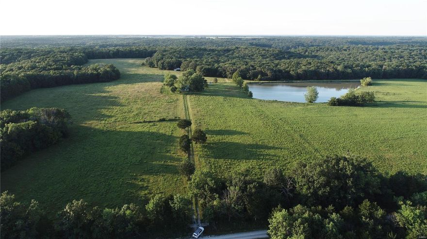 227 +/- acres ideal rec property; great hunting, fishing, income, weekend cabin & diverse habitat. 3 ½ acre stocked lake , good access and frontage  Upper Cuivre River, good catfishing. The old house is ideal for hunting cabin or a long weekend. Home site next to the lake.  Good deer genetics and abundant, stand locations & Corridor. Awesome Turkey and Mushroom hunting. Top 50 +/- tillable loam acres in hay,  traditional or organic row crops, cash rent farmer lined up if needed, add'l income from marketable timber. It is hard to find a property this nice and secluded just an hour from St. Peters or Chesterfield Missouri. Back 9 +/- acre field with 20 foot wide tractor road which could be easily opened up for additional row crops or as it is  ideal for recruitment food plot. Usable outbuildings for equipment and ATV’s. Good access to the entire property. This one should be on anyone’s short list in this acreage range.
