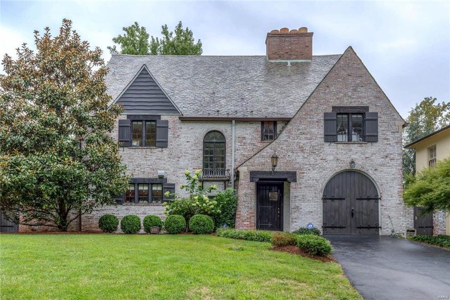 Strong sale with enormous interest! Like being reunited after a long absence! You'll feel the same joy each day you come home to this magnificent Maritz and Young masterpiece. She'll capture your heart and imagination when you pull up. The moment you enter, you'll know you're home and it's THE HOME of your lifetime. Gracious entry with sweeping staircase leads to enormous living room with oversized Tudor inspired fireplace. Sure to be the gathering point for fireside intimacy, storytelling and secrets shared. Entertainer's sized dining room in which eating in will always trump going out. Imagine celebrating the joys of life and those you love from this vantage point overlooking one of the most beautiful patio/rear gardens in Clayton! Sunny eat in kitchen and family room make casual living natural. 4 large bedrooms (1 hosts fireplace; another a sitting room) which offer direct bath access. Captain Elem., Forest Park and the village center are mere steps away. ATTACHED GARAGE. Hurry!