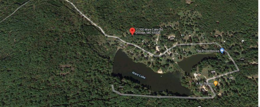 home on 7.5+/- acres. The 1.5-story home is in a very private setting. There are some fruit trees and many other types of trees. There are amazing garden spots. And, if you have horses, there is room for them to roam all on a level lot! 
This is an "as-is" sale, the seller will not do any  inspections or repairs