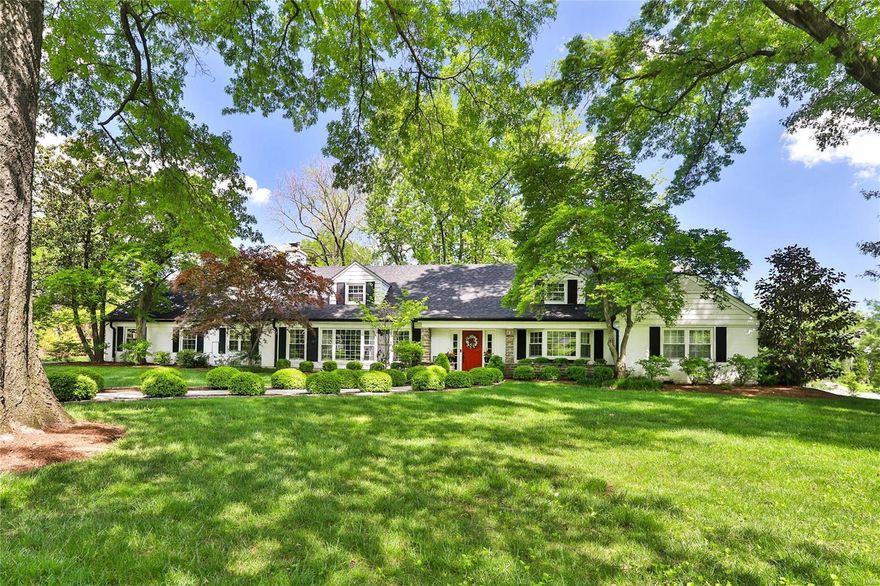 Gracious flag stone walkway welcomes you to this smashing 1.5 story in the heart of Ladue. Open fresh floor plan on professionally landscaped, lush level lot. Large entry, classic, huge living room with elegant new gas fireplace, mill work, wood floors and lovely natural light. Dining room with bay window, custom chandelier and wood floors. Flowing kitchen, breakfast room and spacious family room offers, stainless appliances, double oven, 6 burner gas stove, granitite counters, new wet bar, wine cooler, wood floors, powder room, mud room, and first floor laundry room. Main floor master suite (26ft x 14ft) with luxurious new master bath, double sinks, separate walk-in shower, soaking tub and walk -in closet. Second floor has sitting/study area, updated full bath, 2 large bedrooms, walk-in closet, additional closets, craft room, and huge walk -in (no steps) 40ft x 12ft attic storage closet. Sprawling new driveway with huge turnaround in the back for easy access to oversized garage. Additional Rooms: Mud Room