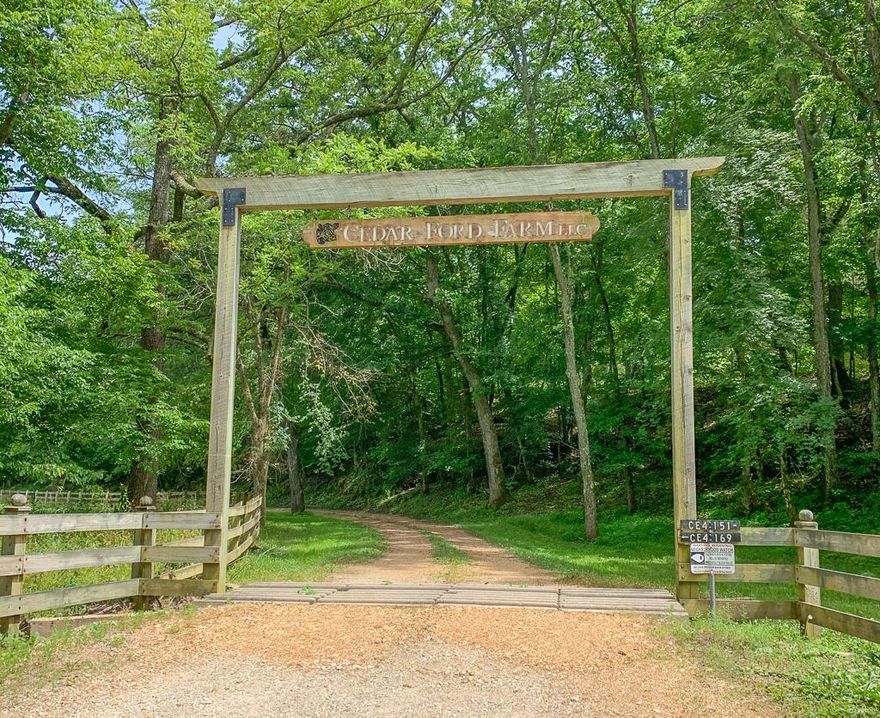 This has to be one of the most beautiful farms that I have ever seen. Close to a mile and half of beautiful flowing Upper Meramec River frontage with its trophy Small Bass Fishing and a stocked 4± acre clear lake. There are also 3 springs.  There is nothing spared, the original farm home, the newer guest home and historical log home all with incredible views.  There are also several very nice barns that have very functional use. There are trails thru out, there is great whitetail and turkey hunting as well as other species. The pastures are lush with good fencing and home to a great herd of black Angus. This is a ranch that has been taken care of and loved and it is time for the next generation to make new memories. The farm is about an hour and half drive from St. Louis. Farms such as this do not come on the open market very often. There is an additional 311+/- acres that adjoins this farm listed for sale. This is a treasure!