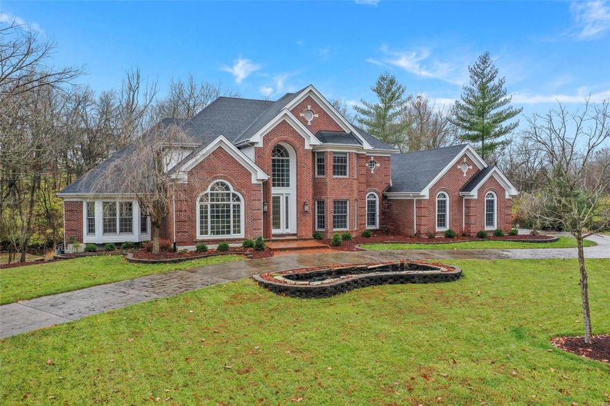 Spectacular 5 bed and 5 full and 2 half bath home with 2 additions and 2 acres of divisible land in the Mason Ridge School District in the heart of town and county.  Brand new kitchen, nearly untouched kitchen features professional Wolff gas range and stainless steel SubZero built in refrigerator.  Muted ashed cabinets highlight the stylishly designed chef's kitchen perfect for family gatherings, entertaining large parties with the kitchen highlighted as the center point. Hearth room has view of the beautiful backyard with peaceful water features. The master on main suite has a completely new bathroom with separate shower, beautiful standing tub, dual sinks and separate water closet.  Three ensuite bedrooms have private baths and a cozy loft.  Amazing finished basement has bedroom, full bath, family room with fireplace, bar, gym, office, game room and tiled private spa room overlooking the soothing water features. Oversized three gar garage.  Cul de sac.  Award winning schools.