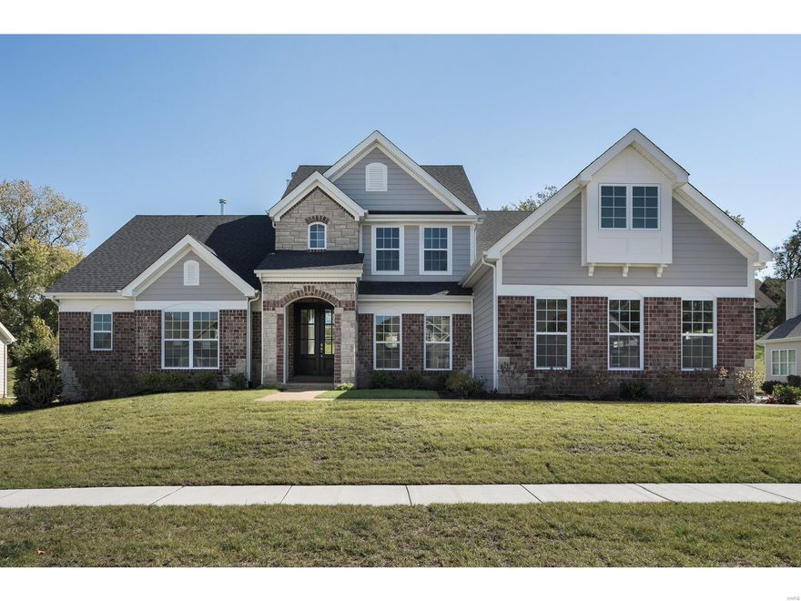 Spectacular 1.5 story by Prestige Custom Homes on a large home site in the Schoettler Grove subdivision. This 4 bedroom, 3.5 bath, home features a 3-car side entry garage, outdoor room, hardwood flooring, gourmet kitchen with custom cabinetry, crown molding, soft close drawers, quartz countertops, Kitchen-Aid stainless steel appliances, under cabinet lighting, built-in lockers, and impressive hearth room with vaulted ceiling and stone fireplace. Soaring 2-story great room offers a fireplace, wet bar with beverage cooler and wine rack, study with vaulted ceiling built-in bookcases. Elegant master bath suite boasts coffered ceiling, separate custom walk-in closets, adult height vanities, stand-alone tub, and vaulted ceiling in master bath. Other amenities include an expansive 2nd floor bonus room and granite vanity tops throughout. Additional Rooms: Mud Room, Sun Room