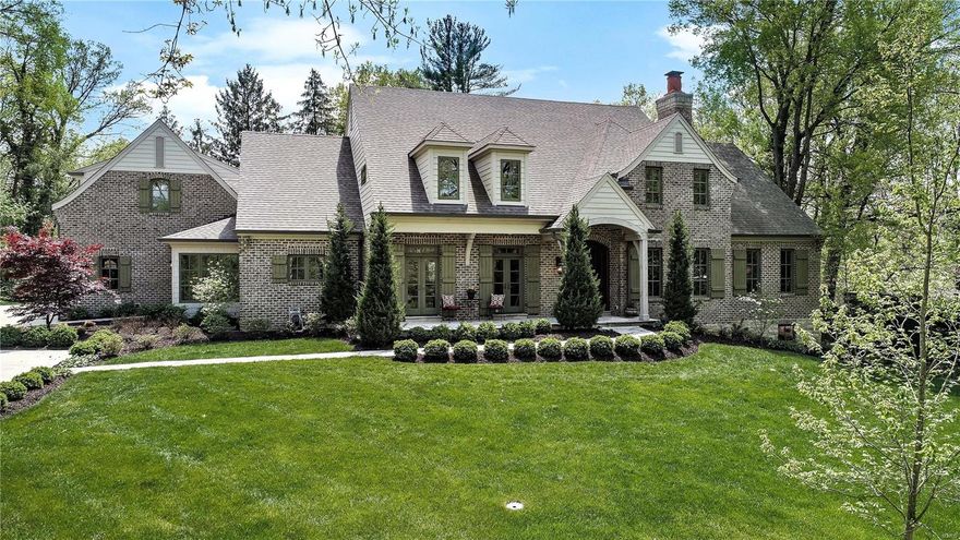 This stunning 5 year old new build on the uber charming Danfield Road will impress you with high end finishes from top to bottom! You will love the soaring tongue and groove wood plank ceilings with structural cedar beams, spectacular two story stone fireplace in the large family room, gorgeous entry with inlaid wood and stone floor, and multiple french doors that walk out to spectacular flagstone patio with fountain. Gourmet eat in kitchen boasts top of the line appliances, a walk in pantry, and gorgeous walnut center island. First floor master suite offers his and her walk in closets, gas fireplace, and light filled bathroom with private deck and outdoor shower. Second floor hosts 3 additional en suite bedrooms all with beautifully appointed bathrooms and walk in closets! Bonus private suite above the garage with mini kitchen. Basement is a generous 10 ft pour walk out with roughed in bathroom. 3 car garage, mud room, first floor laundry, and geo-thermal home system! Welcome home!