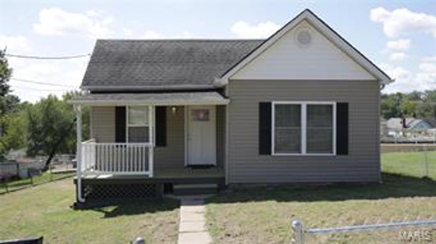 Welcome to your new home! This home is move in ready! From the time you pull up, you will see the yard inviting you to the covered front Porch. You will know this is just for you! Inside this move in ready home you will see the awesome Coffered Ceiling in the Living Room with new carpet. Bedrooms have new carpet and one of the Bedrooms has a Coffered Ceiling as well.  This home has been freshly painted. Large Kitchen with corner pantry, beautiful cabinets, eat in area for Dining, & Access to new deck out the French doors! Another nice thing about your new home is the main floor Laundry Room and Hall Linen closet. Great Starter home or down size but still enjoy the quality of a nice home. The cellar will show off the floor joist. This is an all electric home! Seller to have a stove installed prior to closing. Built in Microwave! Dishwasher! Fenced yard! Enjoy this home with a new chapter of your life!!