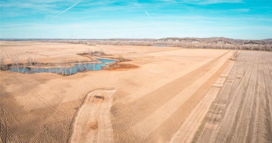 Miller Slough is 141.5 Acres right on the Missouri River in the Northeast corner of Osage County offering an amazing deer, duck, and income combination. There are 89 acres of extremely fertile, high yielding, and levee protected tillable ground currently being rented for $200 per acre. The current farm tenant would like to continue the farming lease. The 30 acres of timber offers some great deer hunting and the levee is a great perch to catch the deer heading to the Ag field. There is a 7.5 acre blew hole in the Southwest corner of the property. This offers a very unique benefit which provides a water source a great distance away from the river. Several key components needed for developing a successful wetland are present on this property. Some of these include multiple water sources for flooding use, good grading for a field wetland and a killer timber hole. This is an extremely rare opportunity to find a property with all these attributes being offered on the real estate market.