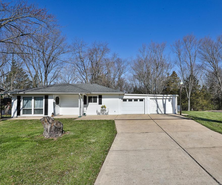 Sitting on nearly an acre, this one story charmer offers the perfect balance of country living w/modern updates. Step into the cozy living room with plenty of natural light, open to the kitchen with oak cabinetry & ample counter space. Two comfortable bedrooms share a full bath with built-ins to accommodate linens & more. Convenient main floor laundry, making household chores a breeze. The oversized, two-car garage provides plenty of space for parking and storage, along with the additional 20x10 detached garage/shed for more storage options. The generous fenced backyard is perfect for your furry friends to play and explore, included poultry 
coop allowing you to indulge your homesteading dreams. Newer touches include luxury vinyl flooring, HVAC, hot water heater, and freshly painted throughout. Add'l features include an extended driveway for add'l parking, private/level backyard, & easy access to I-55