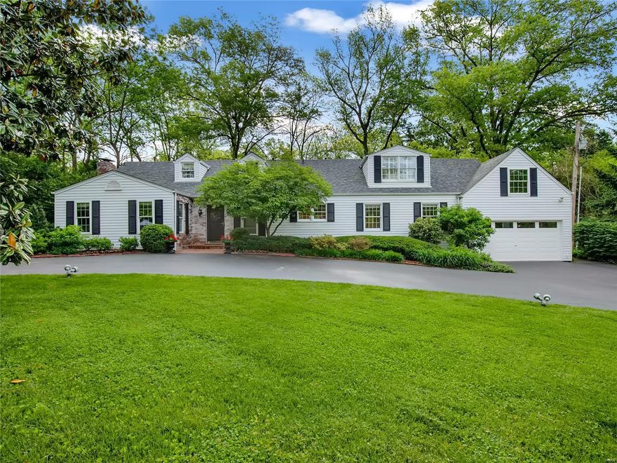 Open Sat. 12-2 and Sunday 1-3. Storybook charm! This 1.5 story situated on a deep 1+ acre treed lot is framed by mature trees and lush plantings.The classic exterior is only the beginning! Original hardwoods, millwork galore.The back of the home offers a magnificent expanse of glass,each room feeling integrated with the garden. Well equipped white Kitchen boasts Sub-Zero refrig, gas cook-top + double ovens. Dining room bay is picture perfect as it too views the backyard while Family room with built-ins, and sun-room each  open to the bucolic terrace. Private MF Master suite, flexible office space near kitchen could also serve as a guest  or homework space. MF Laundry/mudroom. The 2nd floor has 2 ensuite  bedrooms with updated baths. Huge closet. Outside, the scenic setting is perfect for dining and entertaining as it is private, landscaped and big enough for multiple seating areas. Circle drive and large driveway provide for ample parking. Adorable full height shed could be playhouse. Additional Rooms: Sun Room