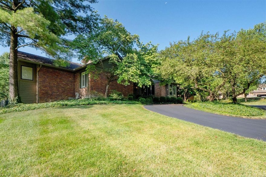 Refined sophistication is on full display in this impeccable 4+ Bdr., 4 Bath home w/over 5,000 sq/ft of living space on a 1-acre retreat in Terry Hill Lane. This home has been lovingly renovated. A large great rm welcomes you w/vaulted ceilings, custom millwork, wood flooring, floor-to-ceiling windows, fireplace, & neutral palette. The dining rm has a china cabinet & windows providing a view of the property. The gourmet kitchen is perfection w/custom white cabinetry, center island, quartz counters, high-end appliances, & walk-in pantry. Eat-in breakfast rm w/butler’s pantry, beverage center, display shelving opens to 4-season rm that overlooks in-ground pool. Primary bedroom complete w/ built-ins, 2 walk-in closets, bathroom w/ 2 sinks, makeup vanity, 2 person jetted tub, walk-in glass shower, water closet w/ bidet, & separate office. LL walk-out has 3 large bedrooms w/ walk-in closets, built-ins, jack-and-jill bath, rec room, fireplace, work-out rm, & storage. This is one of a kind. Additional Rooms: Sun Room