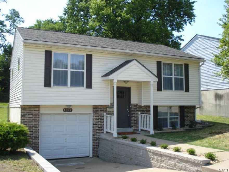 Beautiful home located in desirable Dogtown area. Minutes away from Forest Park, the Zoo, restaurants, night life and shopping.  3 Bedrooms and 2 full bathrooms! Lots of nice updates. Large updated kitchen with granite countertops ( all appliances are stay) Two upstairs bedrooms with ceiling fans and large master bedroom suite on lower level with walk in closet, both bathrooms boasts ceramic tile flooring and granite countertops. Large patio and fenced in backyard ideal for grilling with friends or just for the pets or kids to play. Large garage with ample room for storage. Additional insulation added around skylight 2015, New AC 2015, new dishwasher 2016, new microwave 2017.  Don't miss your opportunity to live in a wonderful neighborhood!