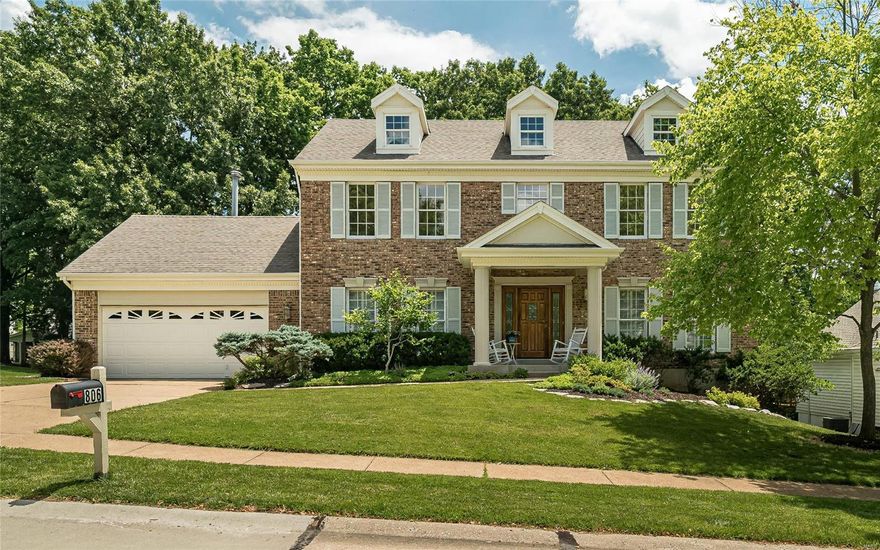 Great curb appeal, beautiful landscaping and a wonderful back yard welcome you home!  The full brick front has a covered porch, a entry door has leaded glass w/ leaded glass sidelights.  2 sty foyer is flanked by formal living and dining both with crown molding.  Living room leads to a large family room complete with fireplace & a 5 window bay. A dry bar separates the family room from breakfast room & kitchen.  There's a planning desk, butterfly center island, stainless steel appliances and a main floor laundry.  Upstairs, the master suite includes coffered ceiling, a large walk in closet, full bath with double vanities, soaking tub and separate shower.  The hall bath upstairs is recently updated. The remaining 3 bedrooms are generously sized with ample closet space.  The cedar deck spanning the back of house overlooks a great yard.  The walk out lower level has a rough in for a full bath. James Hardie siding!  Great location, great Parkway schools, and a wonderful neighborhood!