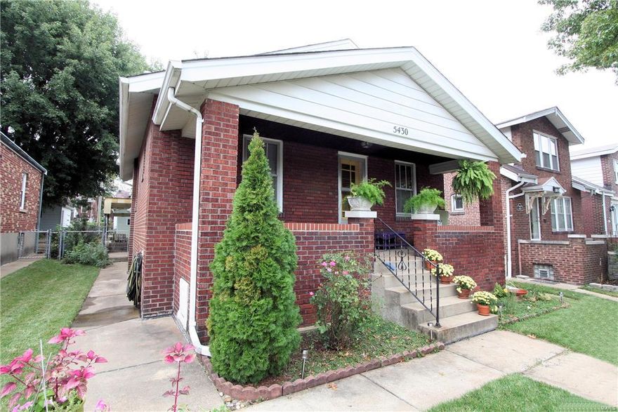Beautiful brick bungalow on a quiet street in the Princeton Heights neighborhood. This delightful home opens to a spacious, sun-filled living room with decorative fireplace, that leads to a large dining room, all with hardwood floors and an open floor plan that is perfect for holiday gatherings! The eat-in kitchen boasts ample cabinet and counter space, newer stainless steel appliances, and lots of natural light. Two large bedrooms, each w/plenty of closet space, and an updated full bath complete the main floor. The walk-out lower level could easily be finished to add to the living space of the home, and includes sep. storage rooms. Outside, a covered patio creates the perfect entertaining space in the level, fenced backyard. An oversize 2 car garage features an extra workshop space/chicken coop, for the ultimate in off-street parking convenience. A covered porch and elegant landscaping only add to the curb appeal of this stunning home! Close to highways, restaurants, and so much more! Additional Rooms: Mud Room