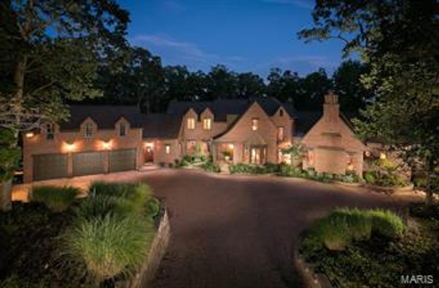 Approx 25 min west of Webster Groves. The current owners built their dream home w/architectural & interior design features reminiscent of English & European residences. Superior quality craftsmanship. Brick/stone exterior. 4 bedrooms, 4.5 ba's. Three levels of finished spaces. The 1st fl grand entry provides easy flow to the main living areas. The "signature rooms": a magnificent 2 story fam rm w/a cathedral ceiling; a formal dining rm w/box beamed ceiling; a butlers pantry; a WOW kit, hearth rm and a large screened-in porch. A laundry rm, office and pantry area. Large outside deck. 1st fl master ste and an magnificent wood paneled office/den. The 2nd fl features a Romeo & Juliet balcony over the fam rm, 1 bedroom suite, a large bathrm area utility rm. The LL has a large rec/fam rm, an outside covered patio area, a large exercise rm w/a hot tub and bathrm/spa. 2 bedrms and another full bath. Work shop & xmas storage. Large 3 car garage. 10 acre lake/dock. App 100+/- acres. Large shed.