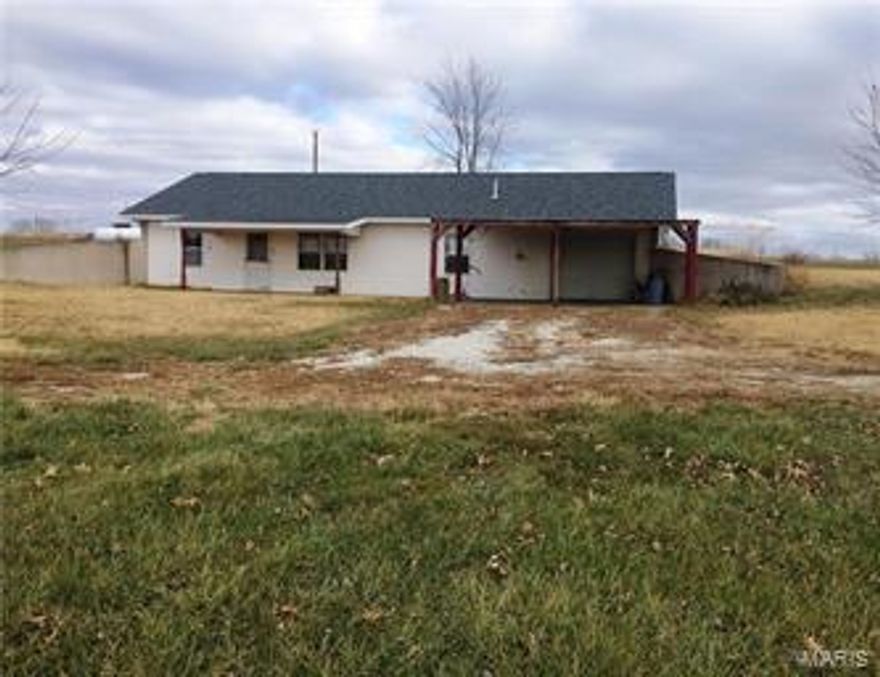 With a little TLC this is a great home for a weekend retreat or full time living.  1,520 Sq. Ft. earth home located near any sportsman’s paradise!  This home sits on 2.3+/- acres and is located just minutes from many of Mark Twain Lake’s boat ramps and 45,000 acres of public hunting ground.  Property has numerous fruit trees (peach, apple, pear) and grape vines.  Located within walking distance of the local Restaurant/Bar.  Property Sold As Is.