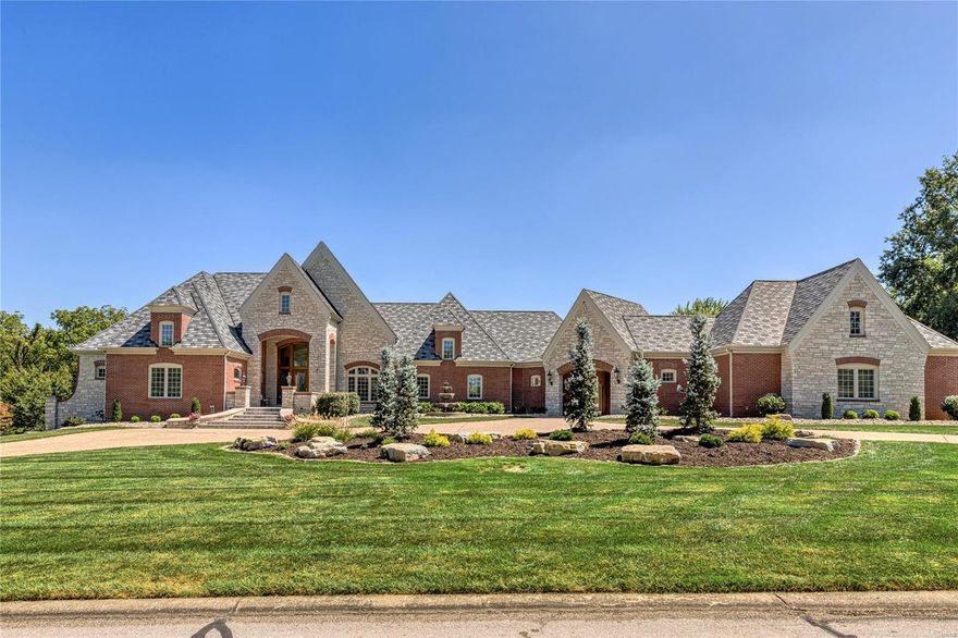 Spectacular Cover-design Estate home from award-winning builder J L Wise. Exquisite artisan-crafted leaded glass entrance opens to 2-sty foyer, formal dining room framed by arched entryways & architectural columns & stunning great room with floor-to-ceiling cast stone fireplace & expansive windows that overlook the 17th hole on the South course. Designer kitchen with granite countertops, 42” bisque cabinetry & commercial grade appliances adjoins breakfast room with wine bar, gathering room with wide bay window & sunroom. Coffered primary bedroom suite with marble bath with shower spa & jetted tub & 2 additional ensuite bedrooms complete the main floor living area. Lower Level includes recreation room with fireplace, media room, gathering bar, office, workout room, 4th bedroom & full bath. Situated on a 1-ac lot with outdoor living room with grilling station & fireplace, patio with firepit & pool surrounded by landscaped gardens plus porte cochere, 2-car garage & finished 3-car garage. Additional Rooms: Mud Room, Sun Room