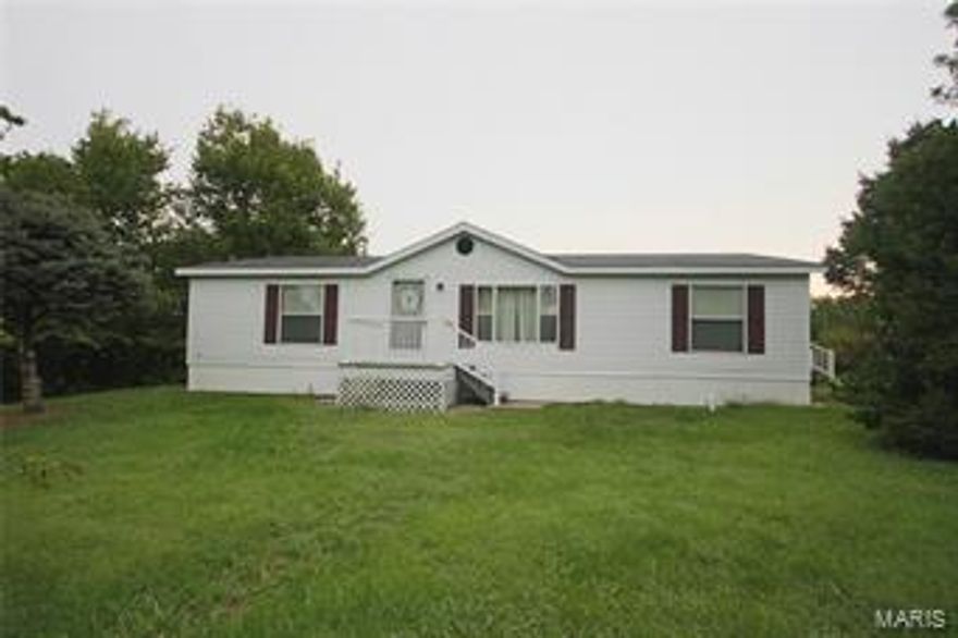 Are you ready for small town living in the country? Get some elbow room on this 4 acres m/l that features a lovely home with 5 outbuildings! Raise your own eggs or small livestock in the back portion of the property. Enjoy the large front yard that overlooks the surrounding hills, rural countryside, and "small town America".  This 3bd 2 bath home includes a living room with vaulted ceiling, kitchen and dining area, a spit bedroom arrangement with a Master Bdrm and full bath, 2 more nice sized bdrms with full bath, and main floor laundry. Located in Clopton School District with good hwy access. The best of both worlds in a price range that's hard to find!