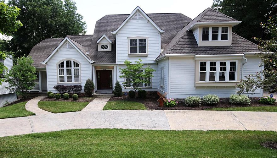 Fabulous Value, GREAT PRICE  for this great  1.5 story house across from Tilles park , inside you will find gorgeous  wood floor with decorative borders , arched doorways, hearth room with cathedral ceiling all open to the top of the line kitchen with granite, viking appliances, subzero fridge, 6 burner gas range, 2 brkfst bars, huge center island, 3 sets of butler-style pantries w/glass front door, wet bar too, main floor master bedroom with coffered ceiling, bath with multi head shower, two laundry rooms main and 2nd floor. 2nd floor all 3 bedrooms have own private bathroom, plus sitting room and large bonus room perfect for kids or gust.Walk out basement with large family room and rec room plus media room. Huge treed yard and playground, large size deck.