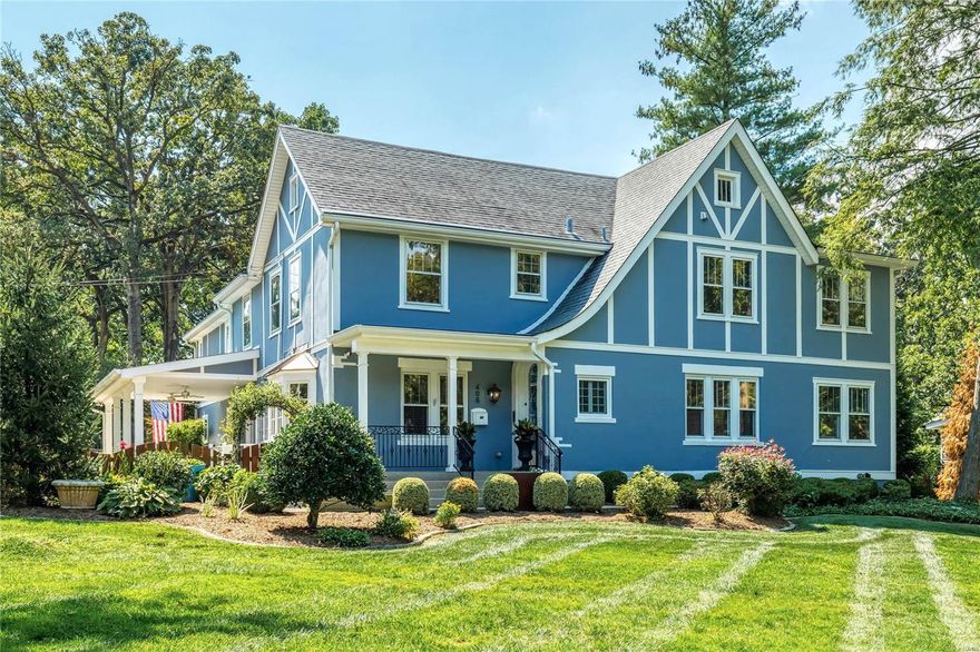 Located in Webster's most desired historic neighborhood, this exceptional 1.5-sty Tudor has been extensively updated throughout while maintaining the charm & character of classic architecture. Tiled porch entrance & artisan stained glass front door lead to hardwood foyer, dining room with wide bay window, butler’s pantry with wet bar & spacious living room. Designer kitchen with marble countertops, premium appliances & 9’ center island adjoins breakfast room with French doors to patio & family room highlighted by marble fireplace. Stained glass double doors open to master bedroom suite with slate fireplace, bookcase & luxury bath with laundry. Oak staircase accesses a 2nd master bedroom suite with marble bath with jetted tub plus 3 additional bedrooms, 1 with sitting room & ensuite bath, hall full bath & convenient laundry. Lower Level includes recreation room & office. Situated on a set-back lot with private courtyard, covered patio & pool & hot tub surrounded by landscaped gardens.