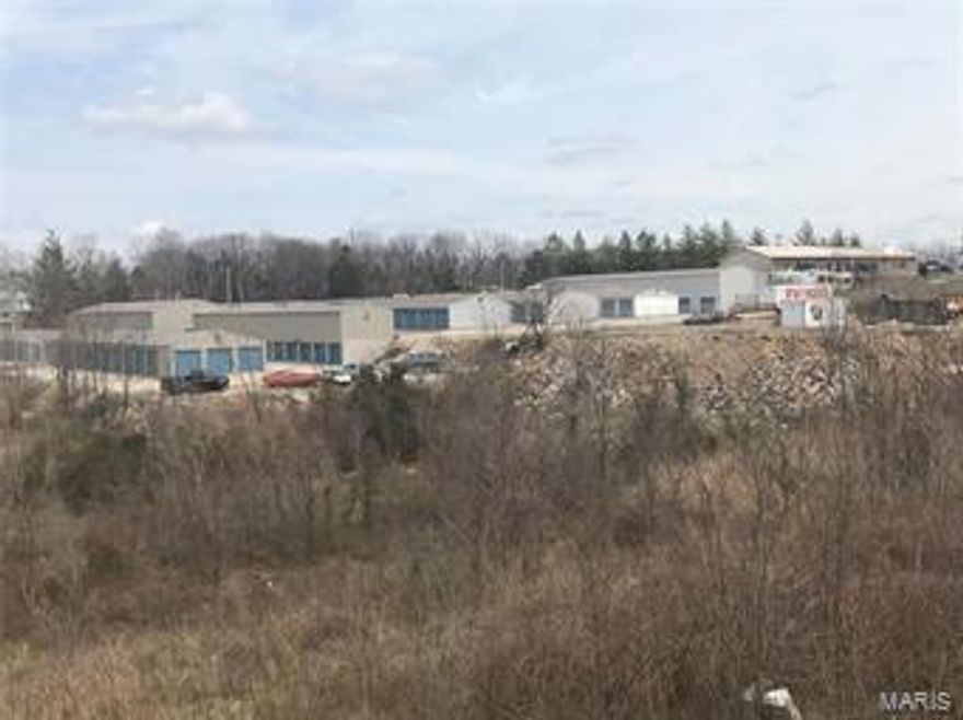 5.5 commercial acres with a thriving storage business. Approx. 36,000 sq ft of storage units. 4,800 sq ft bldg divided into 5 spaces currently a truck rental business. Room to expand. Tremendous opportunity, great cash flow. Appraised as of Nov. 2014 on file. SpecialListingConditions: Probate Location: City, Corner Location, High Traffic, Other, Suburban