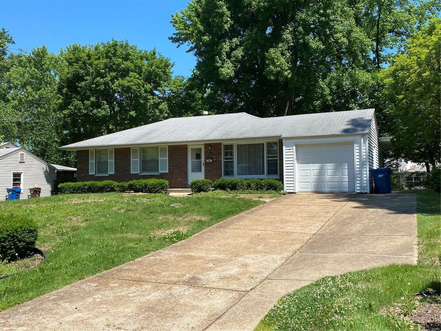 Very well maintained ranch home on a nice tree lined street. Sitting on a great lot, this 3 bedroom home has nice sized rooms and ample closet space. The breezeway was converted to a lovely family room.  Fenced yard and 1 car garage. Must see this home! It is within walking distance to January Wabash Park and its lake, fitness trail, and pool. Close proximity to UMSL Campus and the Touhill Perfoming Arts Center. Conveniently located near highways, I-70, I-170, I-270.