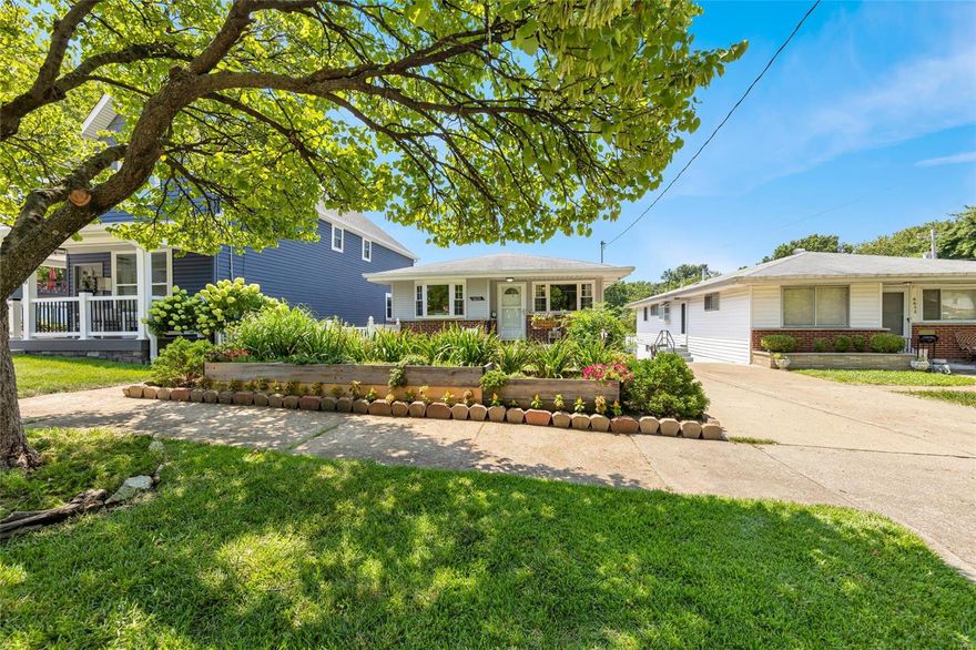 Welcome to 6650 Villa Ave in the heart of Dogtown! This charming ranch home boasts 3 beds, 2 full baths, two spacious living spaces with arched entries showing off the homes character while also inviting you to create lasting memories in it. Step into the fully updated kitchen featuring new cabinetry, pantry, stainless appliances, deep basin sink, & stunning granite countertops w/modern light fixtures illuminating your culinary adventures.The partially finished basement has a huge rec area, full bathroom, large bar and walk-out to the backyard complete w/vinyl fencing perfect for entertaining in private with gate access to the covered carport, a side walkway up to the kitchen & front yard. All while only being minutes away from dining, shopping, activities and the 5-star Forest park! Come and explore all the potential that awaits you at 6650 Villa Ave and don't miss this opportunity to embrace the Dogtown neighborhood's charm and make this lovely house your home-sweet-home.