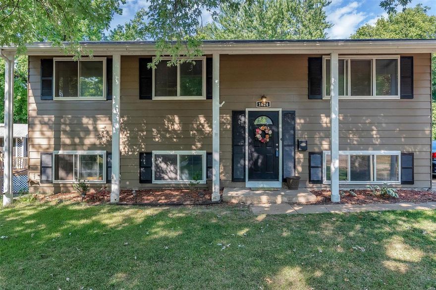 Welcome home! This 4 Bedroom, 3 Bath newly updated home is perfect for the family! It is conveniently located minutes from Hwy 270, Hwy 70, Hwy 170 & Hwy 370 making any commute easy! The main floor boasts 3 bedrooms, FRESHLY painted ceilings, FRESHLY painted doors and door frames, 2 FULL renovated bathrooms, spectacularly refinished real hardwood floors and stairs, open kitchen with new floor and newly stained back deck! The walk-out lower level has another bedroom, bathroom, freshly painted ceilings and a large living area with NEW carpet and still tons of storage! Both the roof, water heater and furnace coil are newer. The long driveway fits 4 cars. The enormous fully fenced lot backs to trees and woods where you will spot a lot of wildlife including deer! The yard is perfect for entertaining and your fur babies will love it! This prime neighborhood is a very sought after, quiet and friendly! Make sure you do not miss this gem!