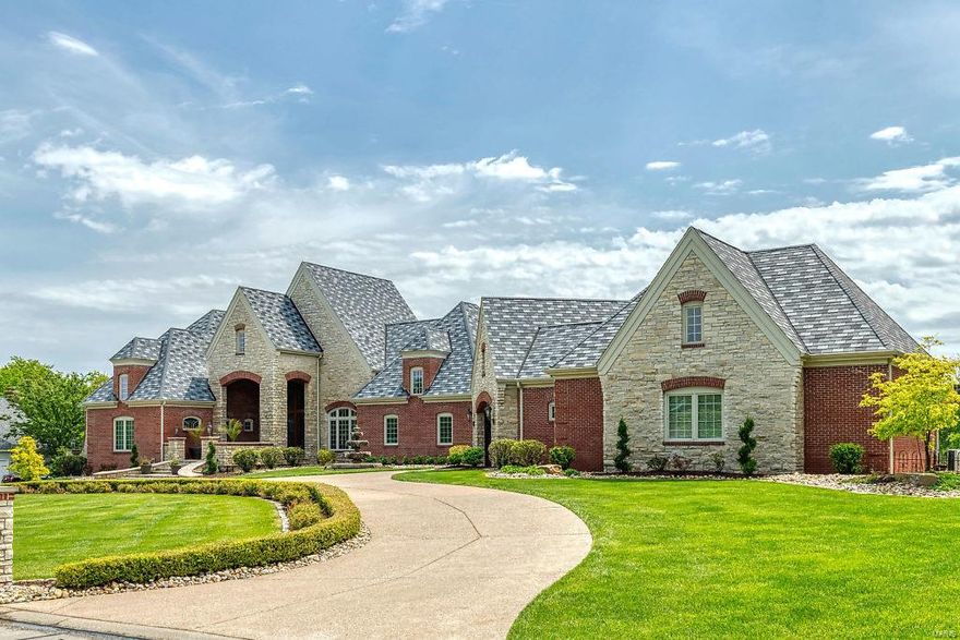 Spectacular Cover-design Estate home from award-winning builder J L Wise! Exquisite artisan-crafted leaded glass entrance opens to 2-sty foyer, elegant dining room with arched entryways & custom built-ins & stunning great room with floor-to-ceiling cast stone fireplace & dramatic wall of windows that overlook the 17th hole on the South course. Designer kitchen with granite countertops, glazed buff cabinetry & commercial grade appliances adjoins breakfast room with granite breakfront, gathering room with wide bay window & sunroom. Coffered master bedroom suite with beautifully appointed bath with shower spa & jetted tub & 2 additional ensuite bedrooms complete the main floor living area. Lower Level includes recreation room with fireplace, arcade, gathering bar, office, workout room, 4th bedroom & full bath. Situated on a 1-acre lot with outdoor living room with grilling station & fireplace & pool surrounded by landscaped gardens plus porte cochere, 2-car garage & finished 3car garage. Additional Rooms: Mud Room, Sun Room