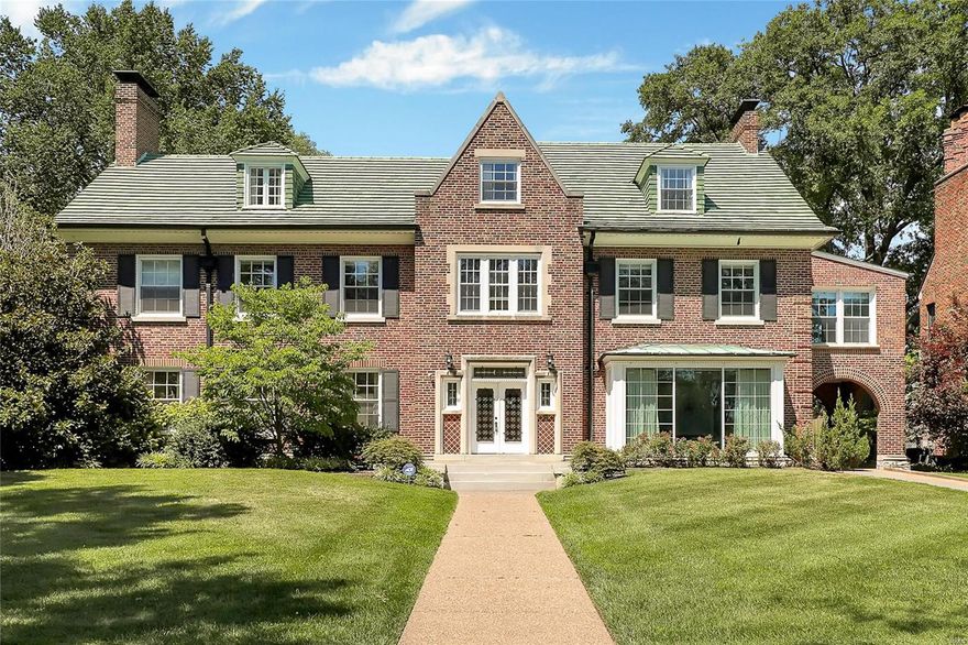 This stately brick home is ideal for today's lifestyle! The circular floor plan is ideal for everyday living and entertaining. Gracious 13X29 center hall entry with terrazzo floors and a sweeping marble staircase with stunning wrought iron railing are what you would expect in this architectural gem!Spacious living room with beautiful stone fireplace, dining room with box bay and decorative mantle, lovely light fixtures, extensive millwork, burled wood doors, Sunroom that is open to living room brings the outdoors in! Kitchen with large center island and Butlers pantry are ideal spaces.25X13 Upstairs landing is magnificent with blt-in bookcases Private Master retreat with fabulous marble bath,  and custom blt-ins. Adjoining sitting room with decorative marble mantle. 2 bedrooms, sunroom and updated Jack and Jill bath are on the other side of the second floor. Incredible 3rd floor, with 3 bedrooms and full bath. Fabulous terrace, pool & pool house with full bath & kitchen! Additional Rooms: Sun Room