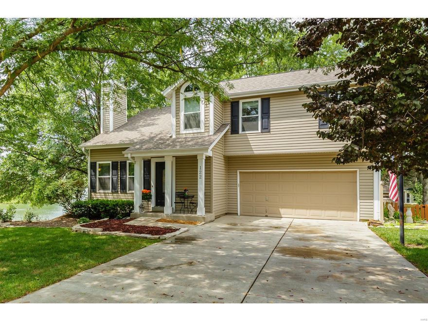 Sip your coffee in the breakfast room and gaze out to the beautiful subdivision pond! Updates have already been done to this charming 3 bedroom with loft, 2.5 bath home. Remodeled (2013) gourmet kitchen with stainless steel appliances, granite countertops, tile backsplash, pantry & custom cabinetry. Gas range.   Updated baths, too! (2018 upper hall bath/2012 master and main half), hardwood floors throughout main floor and upper loft, hall, and master bed. New carpet in bedrooms 2 and 3 (8/18). Open loft area is perfect for den or office. Newer windows (2018), deck and fencing (2017). Newer driveway and roof (2012).  Large deck for entertaining, and yard is fenced with beautiful perennial beds and a swing that faces the pond’s fountain. Finished lower level walkout to patio. Garage features built-in storage. HSA Home warranty, great location and Francis Howell schools!