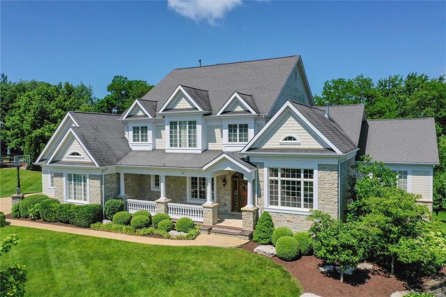 Exceptional home on a private cul-de-sac street in the heart of Chesterfield boasts 5 bedrooms, 5 baths w/ beautiful crown molding & custom finishes throughout. Entry opens to formal D/R  and handsome office w/ custom cherry mill work. Chef’s kitchen features custom cabinetry, granite countertops & large center island that opens to spacious breakfast area & lovely G/R leading out to deck w/ views of the backyard. Main fl master suite offers looks out to private backyard. Master bath features large shower, soaking tub, double-sink vanity & organized walk-in his & her closet. Upstairs includes 3 add'l bedrooms, w/ one en-suite & two that are joined by a Jack-and-Jill bath. Spacious walk-out LL w/custom stone & granite wet bar, rec room, large stone fp & media area that includes a 110” projection screen. Add'l bedroom suite completes the LL. Meticulously maintained backyard w/ deck, paver patio w/ built-in fire pit and hot tub, perfect for entertaining! Sprinkler system & 3-car garage. Additional Rooms: Mud Room