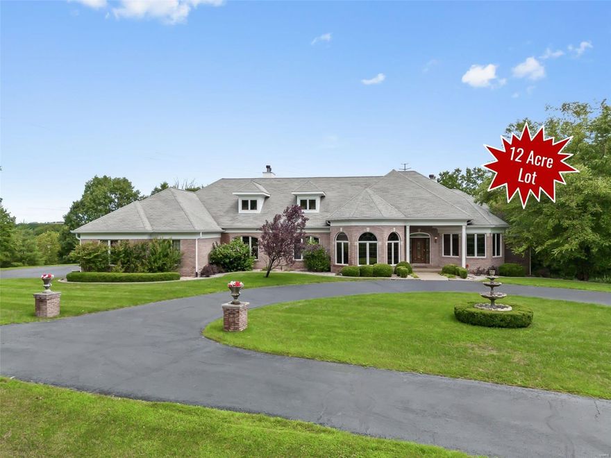 One owner designed, built, & maintained this pristine sprawling custom ranch, & now you can buy it for $300K BELOW recent bank appraised value (available upon request). Nestled on nearly 12 accessible acres of woods w/lake, waterfall, Trex deck/boat dock, gazebo, & 1,500 ft of landscaped trails wide enough for golf carts. Exquisite craftsmanship throughout, w/10' walls, rich hardwood floors, Marvin windows, 5 fireplaces, decorative ceilings, & more. Chef's kitchen w/endless custom cabinetry, 2 dishwashers, double wall ovens, granite counters, 2 pantries, & butler's pantry. Sunroom overlooks the woods. 2 private home offices on the main level & space for more downstairs. Luxurious primary suite w/4 closets & 2 guest suites w/private baths. Huge finished walk-out lower level w/10' pour, wet bar, home theater, & bath. Close to Hwy100/109 for every convenience. Rockwood (Lafayette) Schools. Priced to sell so you can customize to your lifestyle & taste. What an opportunity! See it today! Additional Rooms: Mud Room, Sun Room