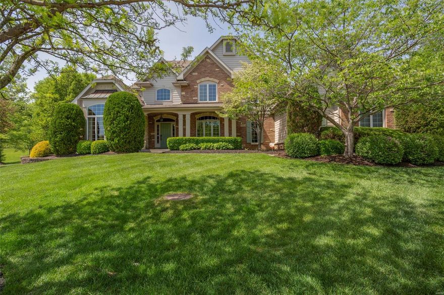 Chesterfield, Rockwood Schools; Five Bedrooms, 4.5 baths, over 6300 finished sq ft in this 1.5 Story with amazing backyard oasis; Two-story foyer with tile floor; Beautiful woodwork throughout; Hand-scraped hdwd floor on most of main level; Stunning, custom, built-in shelving/cabinetry in main floor office; Great room features wall of windows, gas fireplace, & wet bar; Gourmet kitchen w/ newer flooring, granite counters, L-shaped island, top-of-the-line SS appliances, tile backsplash and walk-in pantry; Vaulted hearth room; Main Floor Master Suite features luxurious master bath w/ his-n-hers vanities, walk-in shower, gorgeous soaking tub & prof organized walk-in closet; Three BRs, 2 full baths complete the upper level; Awesome finished LL offers stone wet bar, climate controlled wine room, bedroom & full bath w/ steam shower, sauna; Amazing back yard w/ covered patio, outdoor kitchen & fireplace,  saltwater pool w/waterfall & hot tub all surrounded by beautiful stone landscaping Additional Rooms: Mud Room