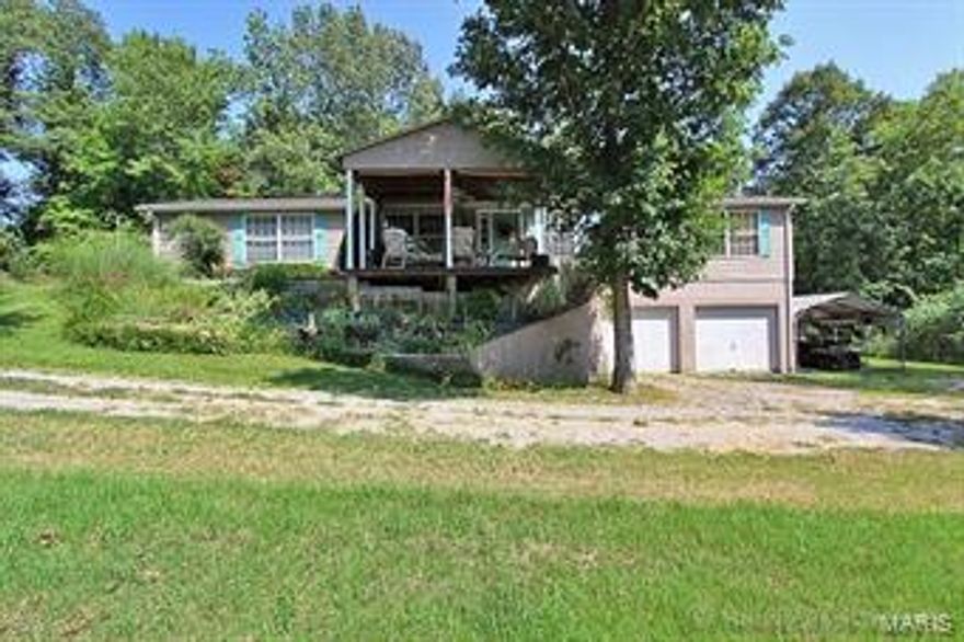 PRICE REDUCTION!!!  Enjoy country living on 5 acres just outside of Gordonville.  Huge home with living room, family room, plus an enclosed sun-porch.  Master bedroom has bath with open vanity area and Jacuzzi tub plus a shower.  Full basement with 2 car garage and lots of storage  plus shop area. Perfect for horses including existing barn. If country living is what you're searching for you must check this one out!  MOTIVATED SELLER!!!  Make an offer!