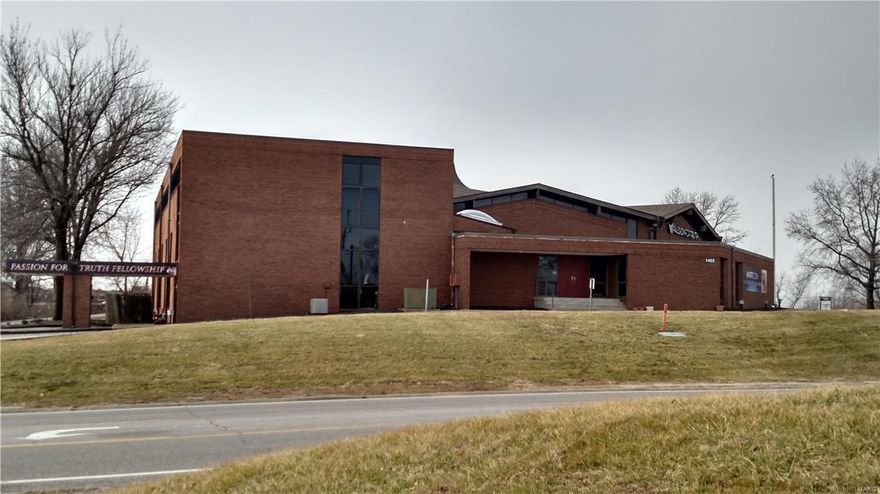 Must see this beautiful and versatile facility! This state of the art facility is designed for all of the technology
you desire. Boasting a Sanctuary that has occupancy for 600, Baptismal pool with changing rooms, Newly renovated first floor office suite, renovated third floor conference room, Green Screen recording studio, classrooms & offices. Kitchen includes stainless steel counters, refrigerator and stove. LL fellowship hall with stage, large parking lot and so much more. The church has lots of electronics that can be sold with the property if you desire them, but some are priced separately, e.g. state of the art "Tricaster"computer system for streaming live services, & lighting systems. Thousands of feet of SDI cabling for cameras is included in the walls. Get ready for this unique opportunity to own this building for your growing church. 

Prime corner at Veterans Parkway and Highway 94 (First Capitol)! Can be redeveloped for other commercial uses, C2 and C3 possibilities!! Some Accessible Features Location: City, High Traffic, Hwy/Interstate Frntg