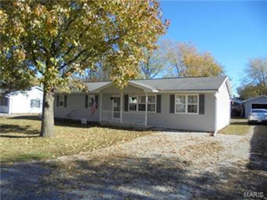 A really nice home for this price. 3 bedrooms, each with a huge closet. 2 large bathrooms. 1 in the hall & 1 just off the sliding back door & close to the convenient main floor laundry room. The kitchen is spacious as is the breakfast room. Both kitchen & breakfast room open onto the huge living room. Best of all for the gardener, the level backyard has room for the flowers or vegetables you want to grow. The 21X16 patio is perfect for summer nights. A 20X19 carport is big enough for 2 cars, but with the 2 ceiling fans, you might want to make it an entertainment area. Finally for the handy man, the 1 car garage/workshop is insulated & heated for any projects you might have.
For now, please don't mind the packing boxes. You'll be able to see this house as a home for you!