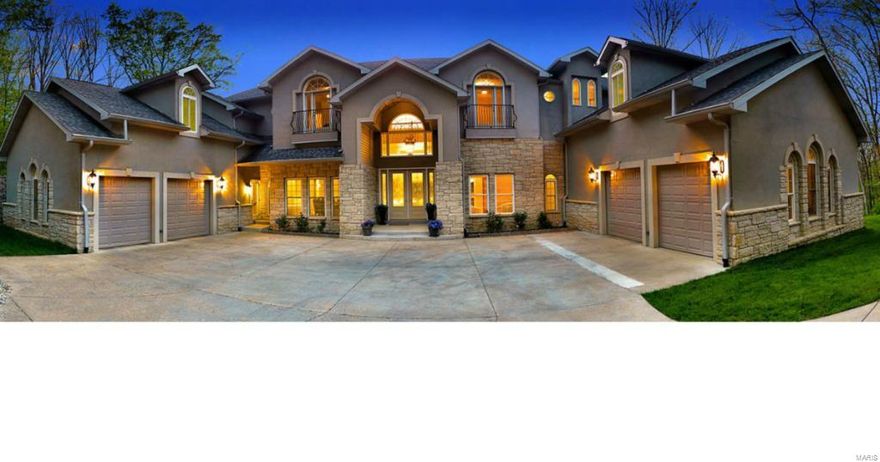 Custom home with awesome space. 23 ft ceilings and 12 ft on 1st floor. 9ft ceilings on 2nd fl and lower level.Master suite on 1st fl with 2 large walk in closets.Finished lower level with wet bar,bath,deck.Some beautiful wood floors and tiled bathrooms. Wood cabinets and granite in kitchen with large center island and two sink areas plus butler pantry and walk in pantry. Arched doorways, french doors, bay windows and trey ceilings. Fireplace in hearth rm with large beautiful windows to view nature. 2-2 car over sized garages 26x30 each. Deck on main and lower level.There are many upgrades. Woods all around. Two driveways. Newer roof 2014. Home was completed for occupancy 10/2011. Close to parks,woods and restaurants.Owner/ Broker.