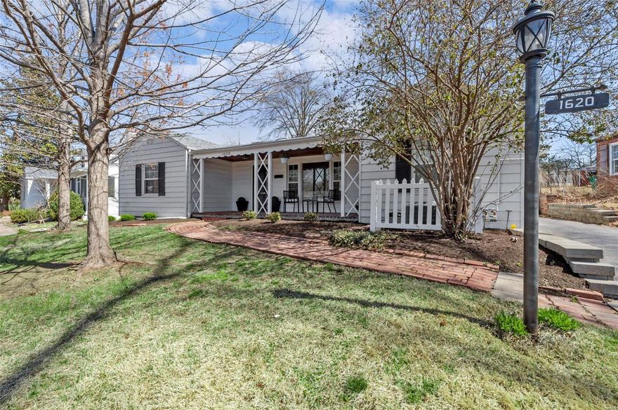 This move-in ready one story home in Webster Gardens emanates charm inside and out.  The brick paved walk and covered front porch are an invitation to explore the classic features blended with an abundance of updates.  Glowing wood floors highlight the living room, dining room, and remodeled kitchen that features newer white cabinets, stainless appliances, and quartz counters.  Fresh decor, newer light fixtures, updated hardware, newer HVAC and a new roof.  It features 2 bedrooms and a bath on one side and a flexible space off the dining room which can be used as a bedroom but currently serves as a family room.  This is all one level living and includes a finished, multi-purpose room with laundry, storage, and mechanical equipment.  The back door leads to a large brick patio bounded with vinyl fencing and beyond is a private backyard with shed for extra storage.