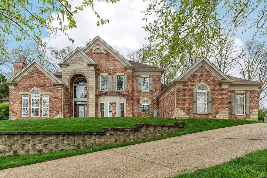 Back on Market-NO FAULT OF SELLER. Resort property features gorgeous 1-1/2 story home on 1.23 ac w/inground beach-entry gunite pool, waterfall & slide, flagstone pool deck, outdoor covered oasis w/2 fireplaces. Beautiful custom finishes in home w/over 7500 sf. fin. liv. space. Marble entry, curved wrought iron staircase, two-story foyer & great room, arched columns, palladian windows, elegant custom millwork. Impressive walnut study w/gas fireplace, built-in bookcases. Beautiful kitchen & brkfst. room w/granite countertops, 2 s/s dishwashers, cherry cabinetry, walk-in pantry, center island. Stunning hearth room w/stone fireplace, quarter sawn oak floors, walnut inlaid ceiling. Luxurious master suite, cove-lit ceiling, his/her walk-in closets, marble over-sized jacuzzi tub, marble walk-in Euro-style 2 person shower. 2 upper bedrooms w/own full baths & addt’l. lounge/bedroom. Amazing lower lvl w/3 bedrooms, 3 full baths, large family/media room, office, work-out room. Gorgeous property!