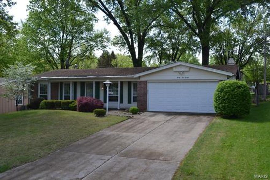 This property would make a great investment property or primary residence. This is a spacious 3 bedroom 2 bath ranch home with 1414 sq. ft., a two car garage and fireplace. Hardwood floors. Newer vinyl windows. Covered Patio. Nicely landscaped. Sought after neighborhood. This one has lots of potential. Needs some updating. Paint  would go a long way in this house. This one should bring a premium re-sale price. Property is corporate owned, seller has never occupied the property. Property is being SOLD AS-IS. Seller will not provide any warranties, inspections, or repairs. Please use Special Sales Contract. Allow 72 hours to review contract. Proof of funds and a copy of the earnest money check to be submitted with contract.