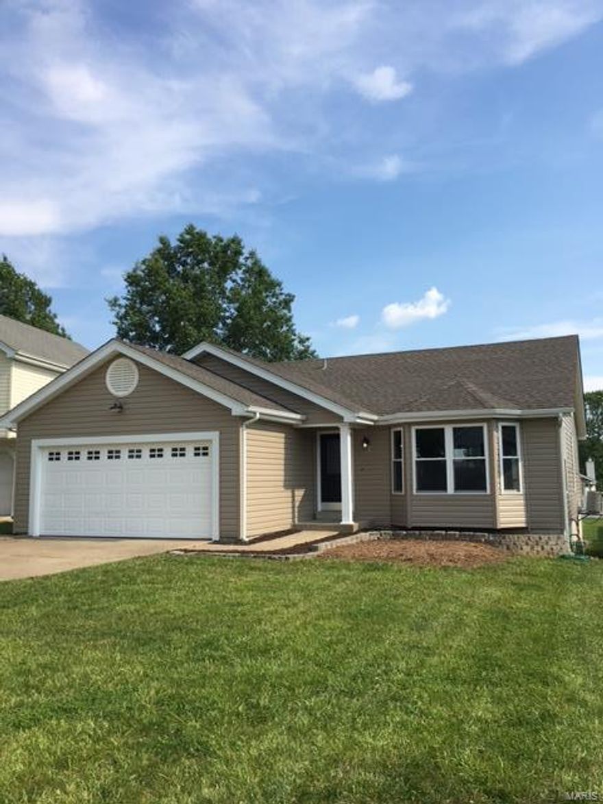 OWNER/BROKER offering this nicely rehabbed 3 bedroom 2 bath home with plenty of extra space in a conveniently located neighborhood, close to shopping, and minutes from I-70 or I-364. All new exterior with roof, vinyl siding, windows, soffit, fascia, gutters and deck. Inside is a nice open vaulted floorplan with hardwood laminate flooring throughout. Nice new kitchen with wood cabinetry and granite countertops and all new stainless steel appliances. Bathrooms feature ceramic tile flooring and new vanities. Walk down to the finished lower level with ceramic tile flooring in an open living area, a nice sized laundry utility room with plenty of storage space, and two bonus rooms which could make a great home office, play room, hobby room, or possible bedroom. Step outsdie to the nice sized deck, and enjoy the use (but not the maintenance!) of the large common ground behind your back yard!